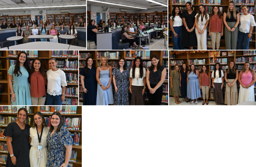 New teachers standing in front of library books on shelves